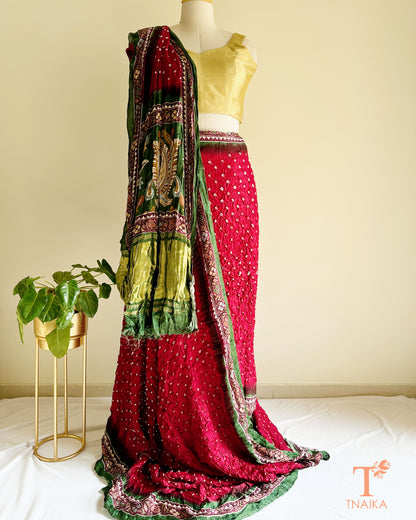 Bandhani modal silk saree featuring Kalamkari palla and tissue or Lagadi Patta pallu