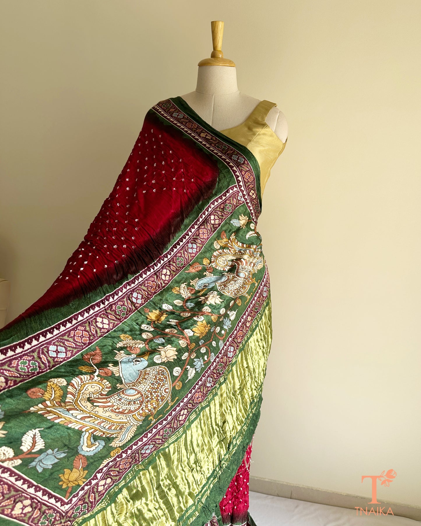 Soft modal silk saree with traditional Bandhani base and Kalamkari design pallu
