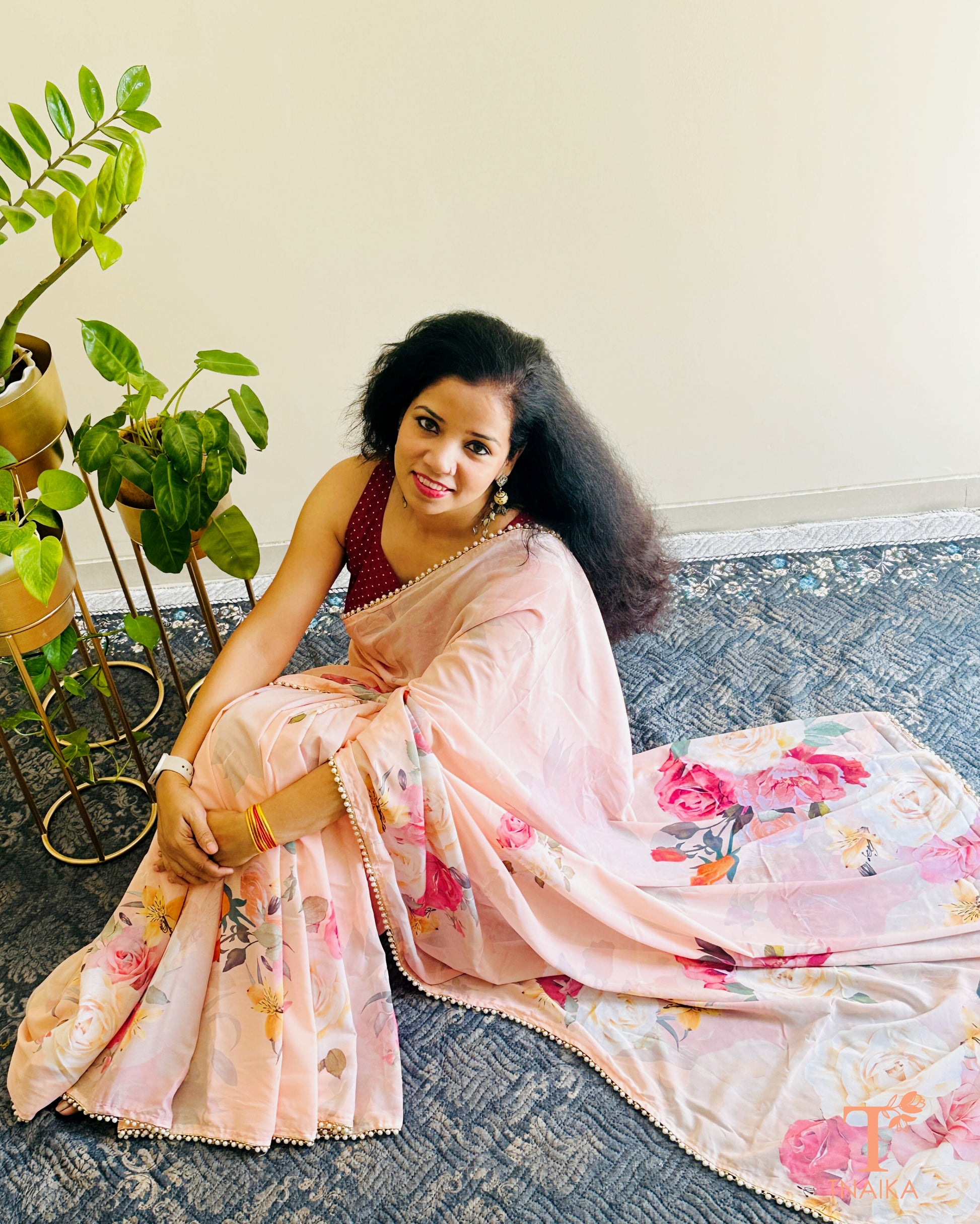 Floral georgette saree with delicate pearl lace border and matching blouse