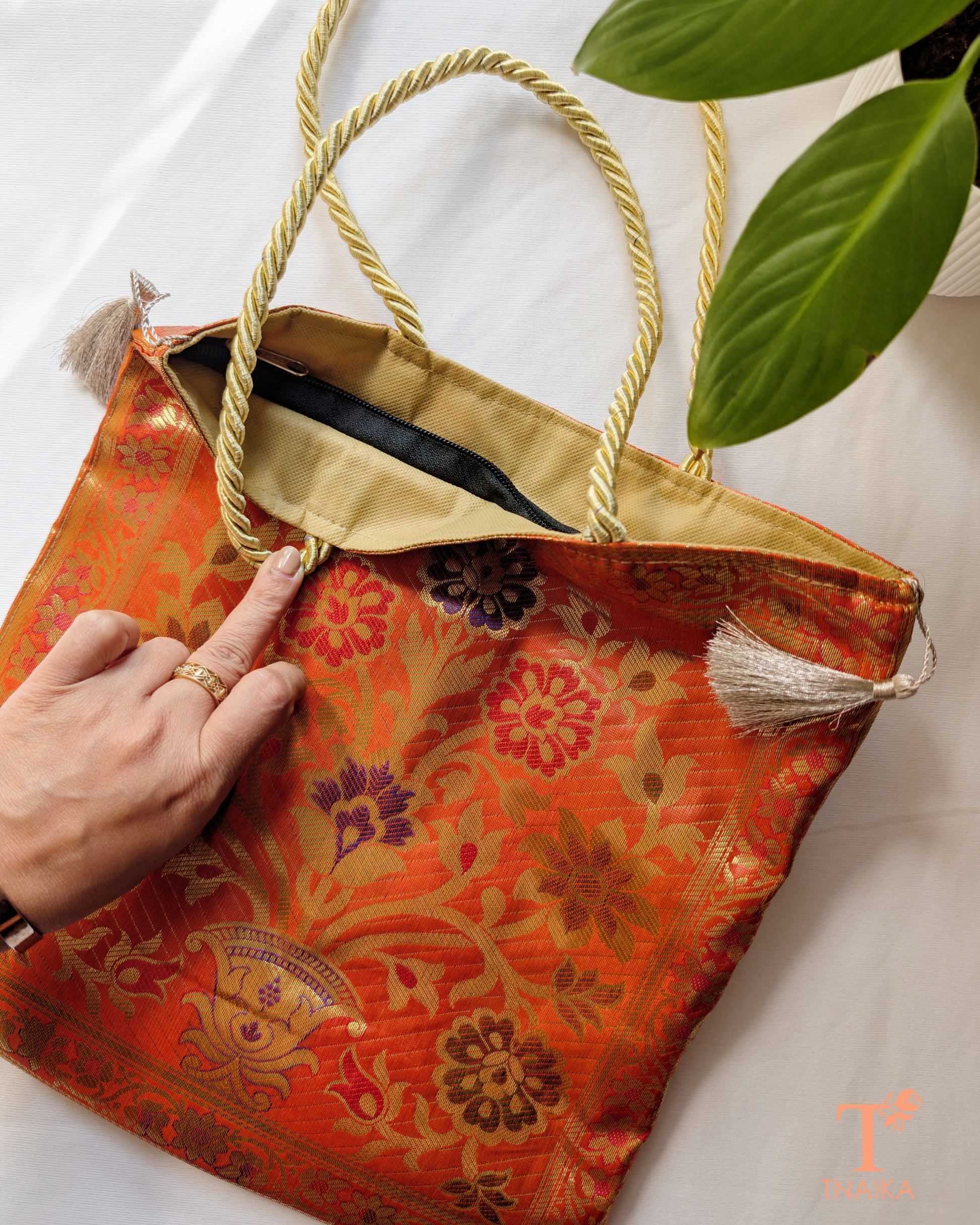 Ethnic Banarasi handbag showcasing classic motifs and elegant finish