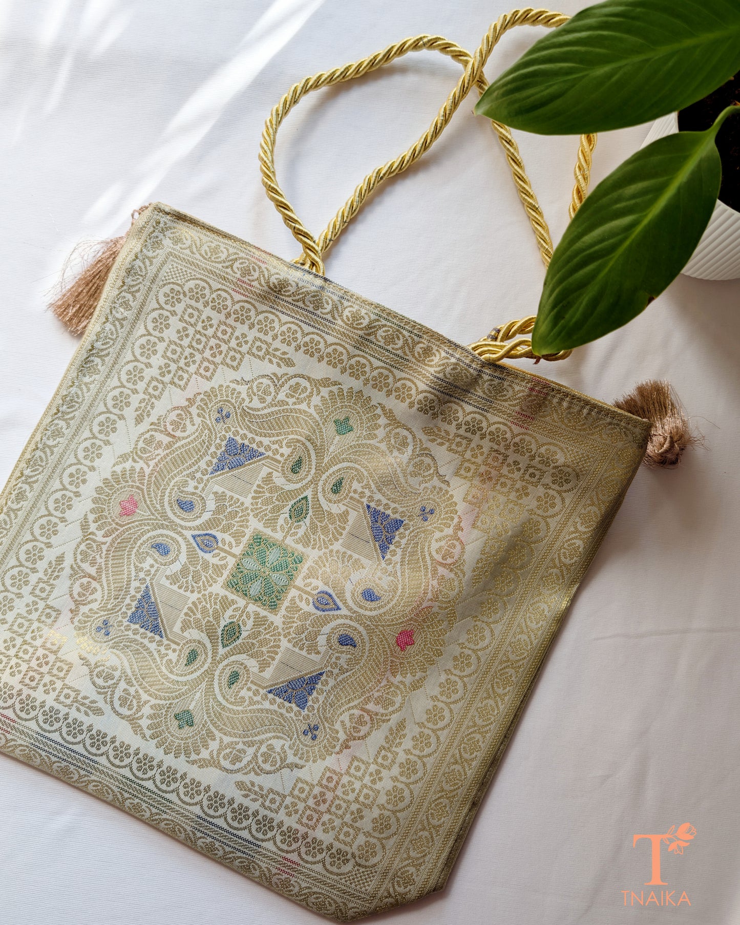 Banarasi clutch bag with intricate weaving inspired by Banaras heritage