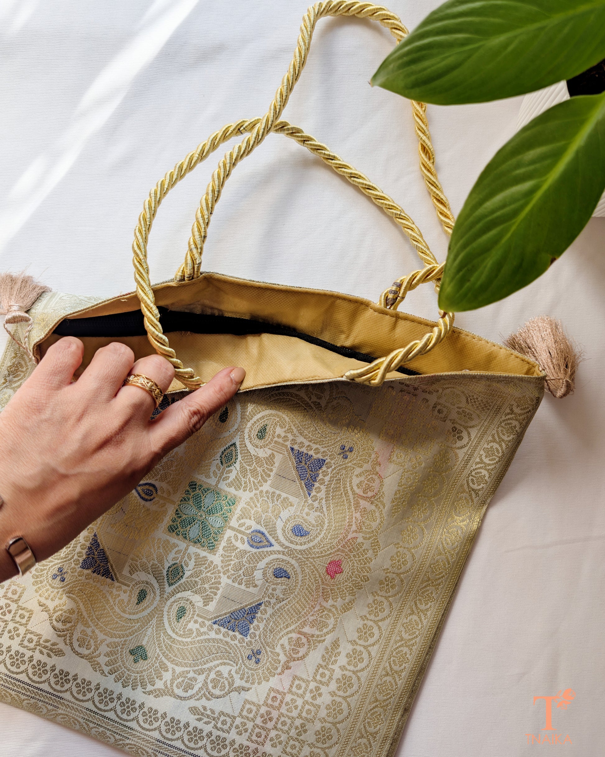 Festive Banarasi purse designed to complement sarees and ethnic outfits