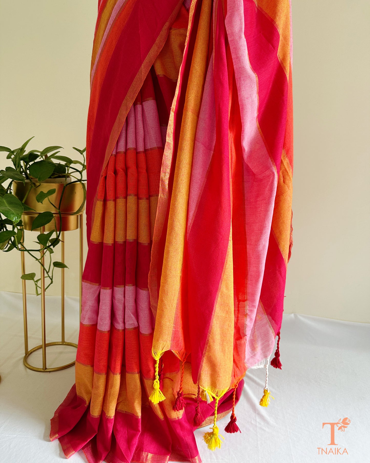 Multicolor khadi cotton saree with soft lightweight drape, perfect for daily wear and summer styling.