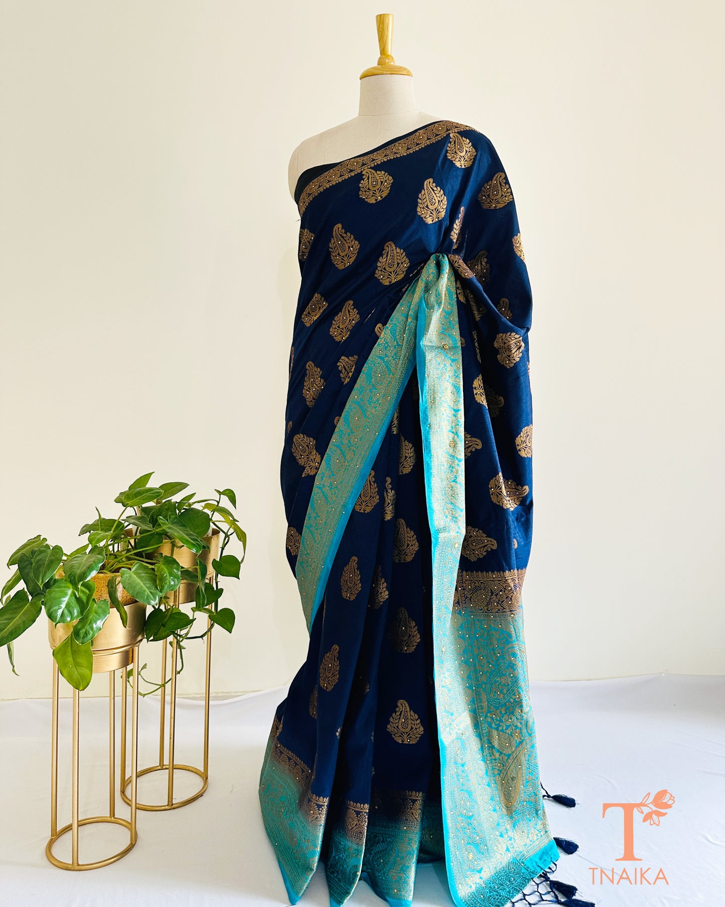 Festive blue light blue semi silk saree with Swarovski embellishments and rich Banarasi inspired look.