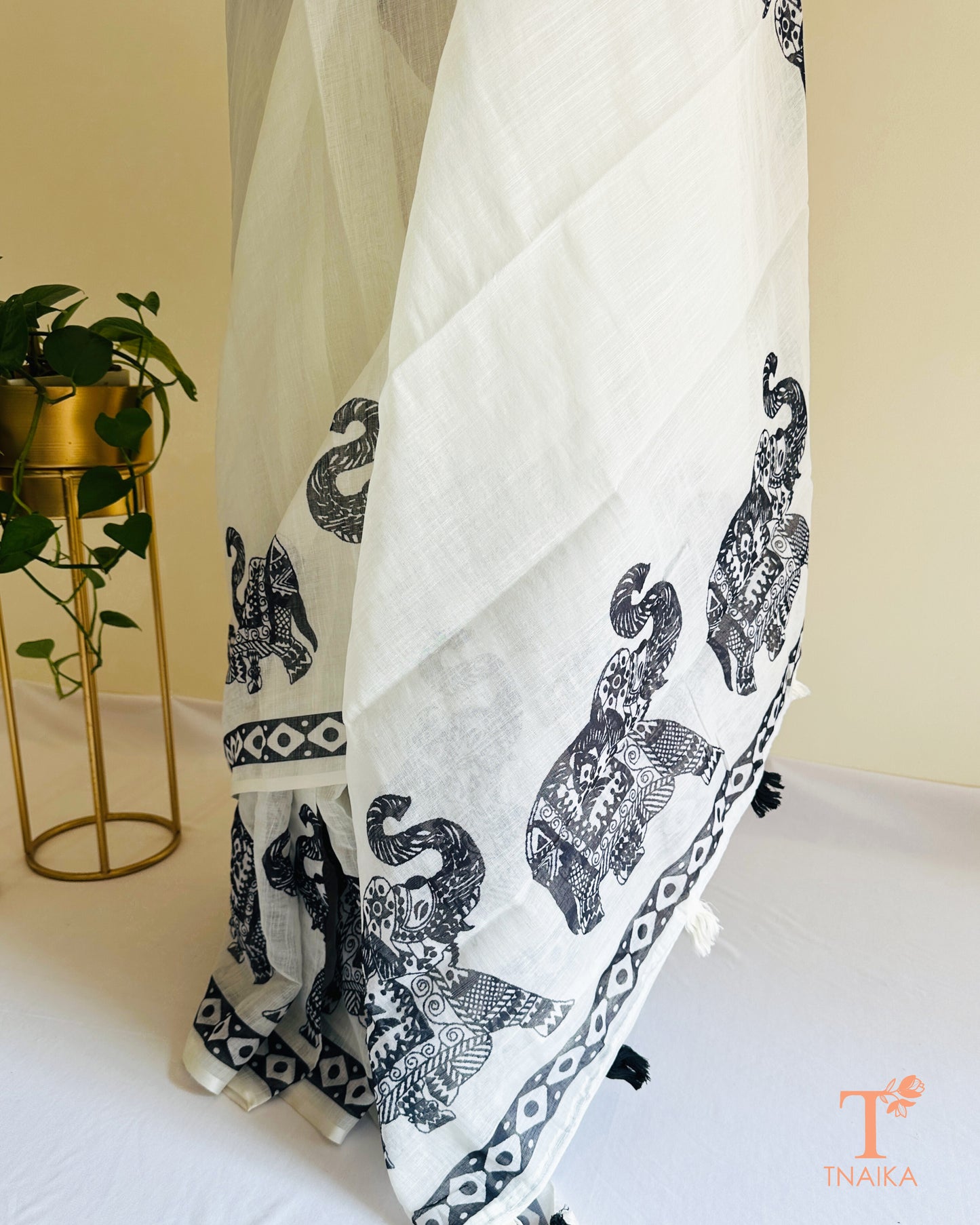 Black and white elephant motif saree for festive wear