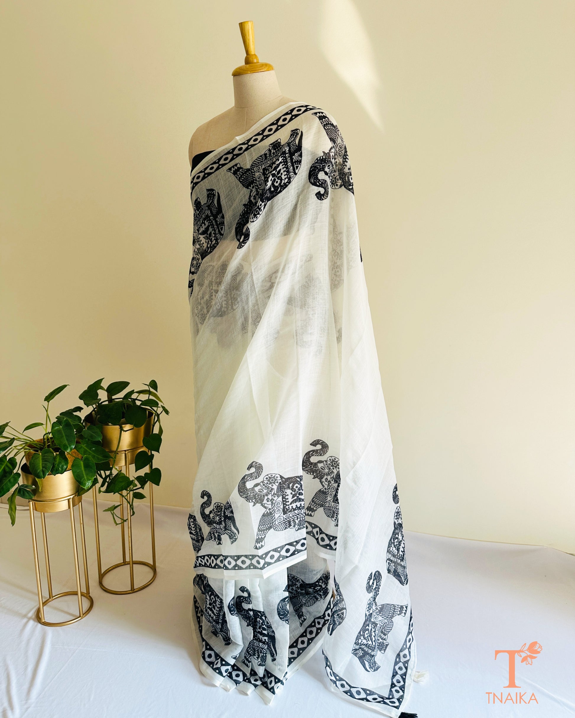 White saree with black elephant hand block inspired print