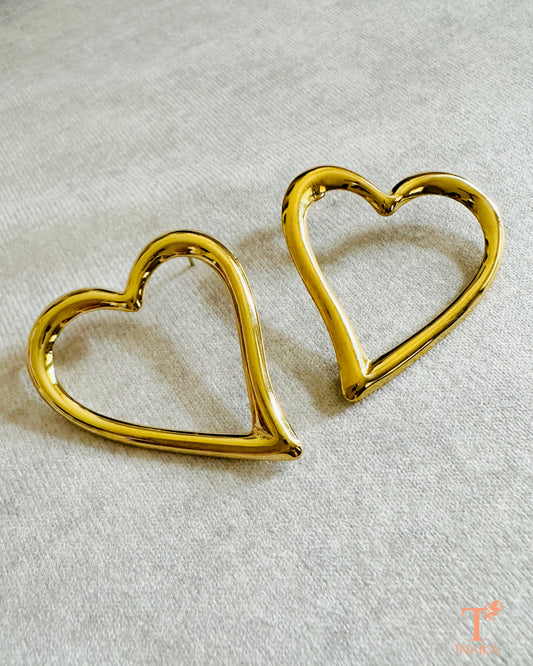 Minimal open heart anti-tarnish earrings in gold, lightweight statement studs for women.