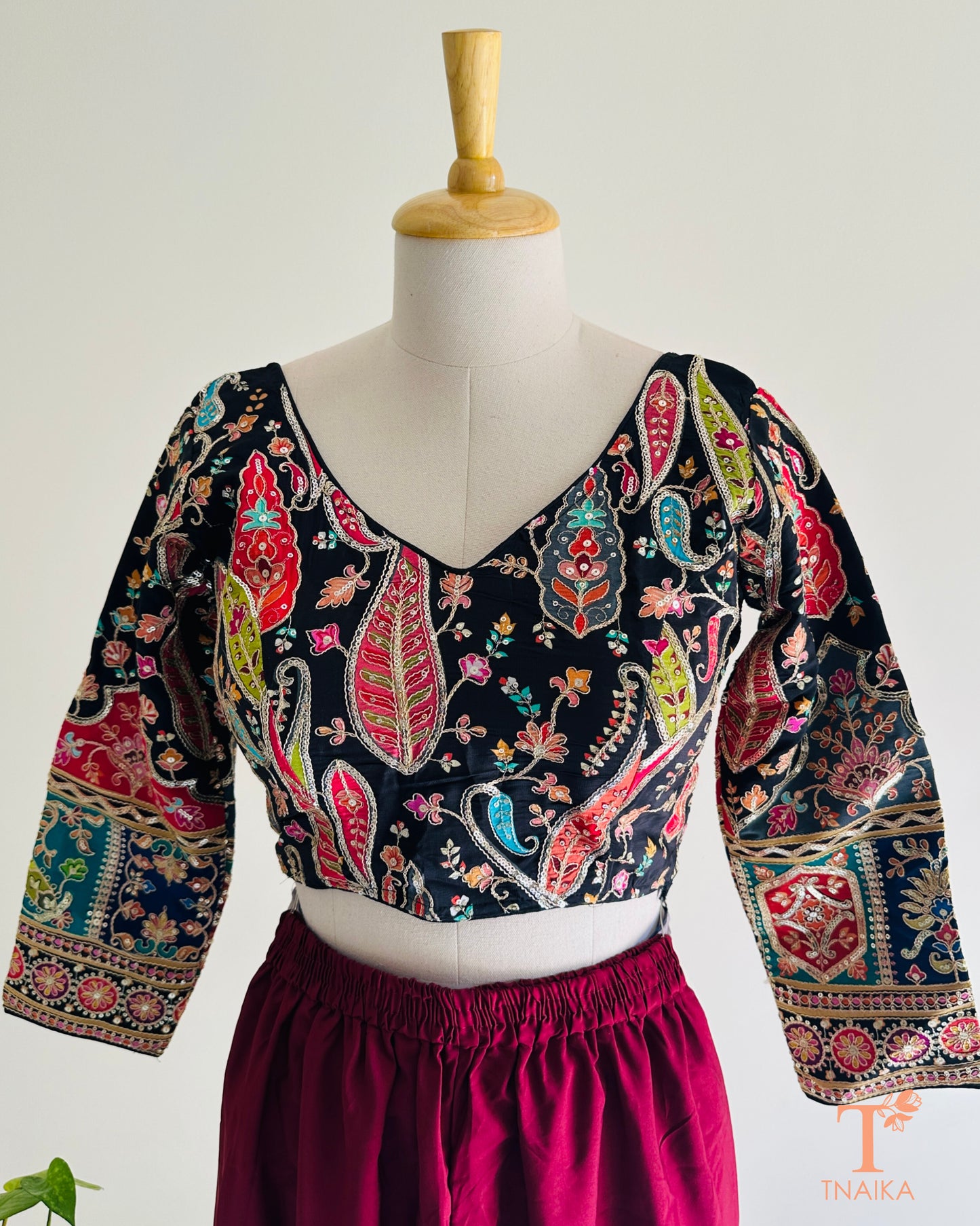 Embroidered pure crepe blouse with premium lightweight drape and elegant detailing, perfect to pair with sarees.