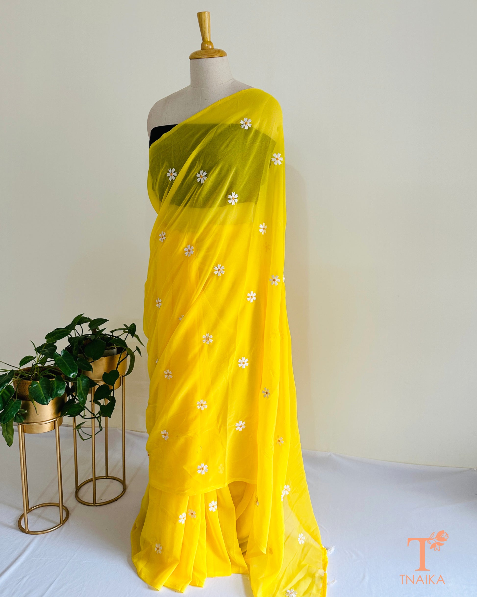 Lightweight georgette saree with Parijat flower design