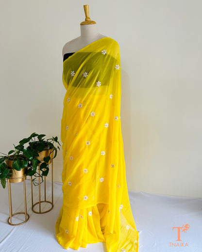 Lightweight georgette saree with Parijat flower design