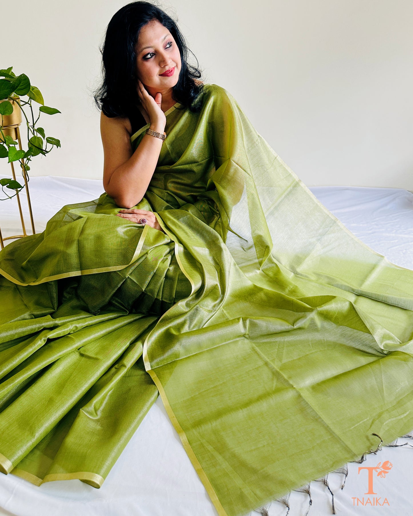 Green Chanderi tissue silk saree with soft sheen and running blouse