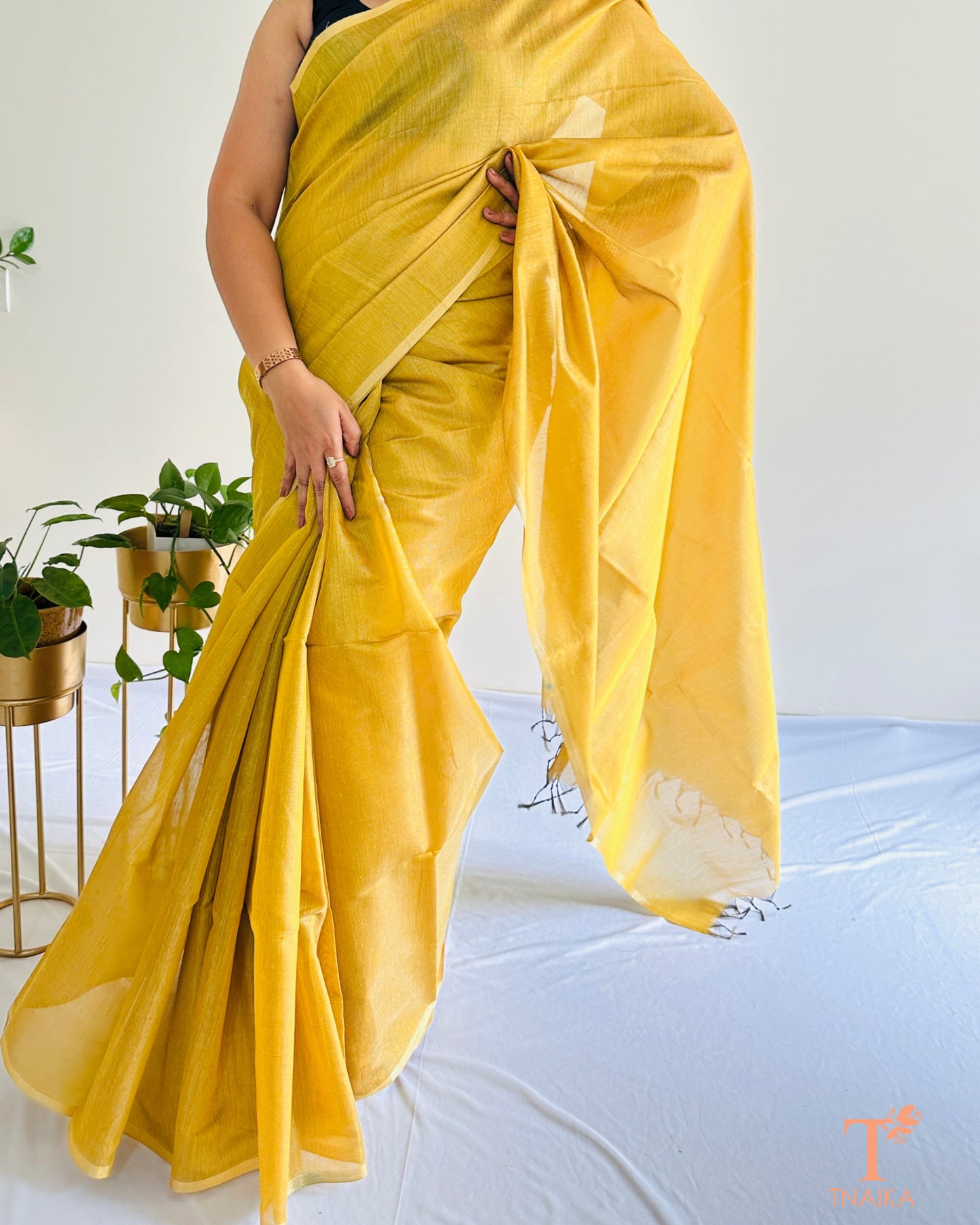 Chanderi tissue silk saree in mustard yellow shade with lightweight drape