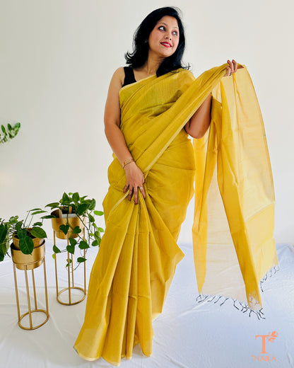 Mustard yellow Chanderi tissue silk saree featuring smooth texture and sheen