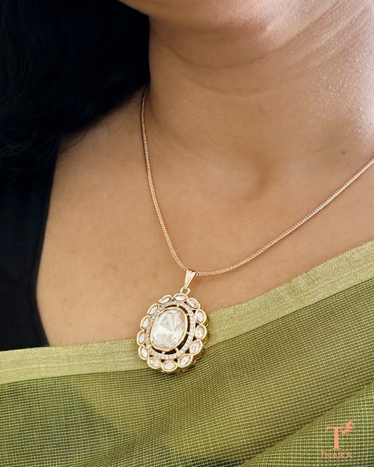 Minimal polki necklace set featuring a pendant chain and coordinating stud earrings.