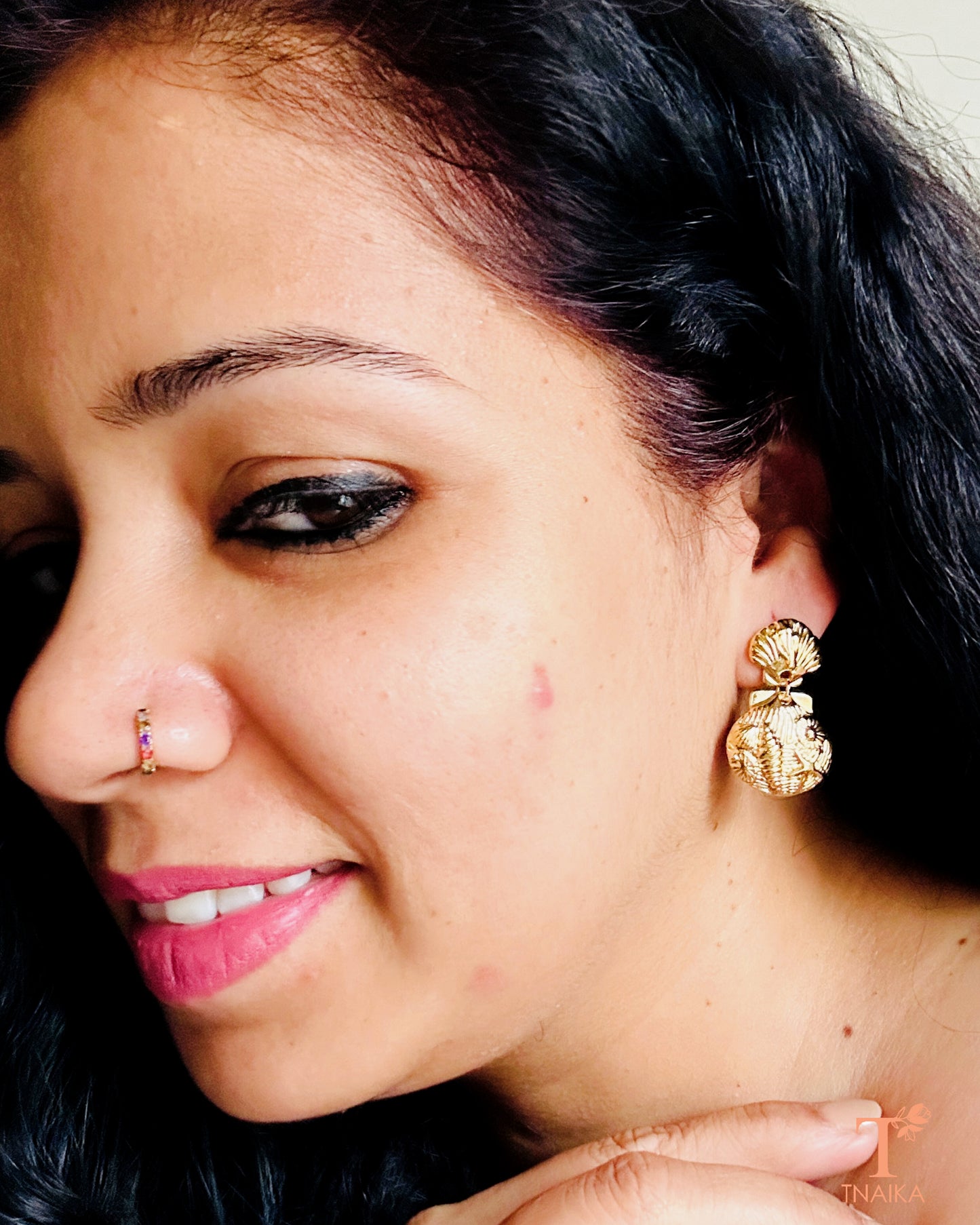 Anti tarnish gold finish earrings with detailed surface design