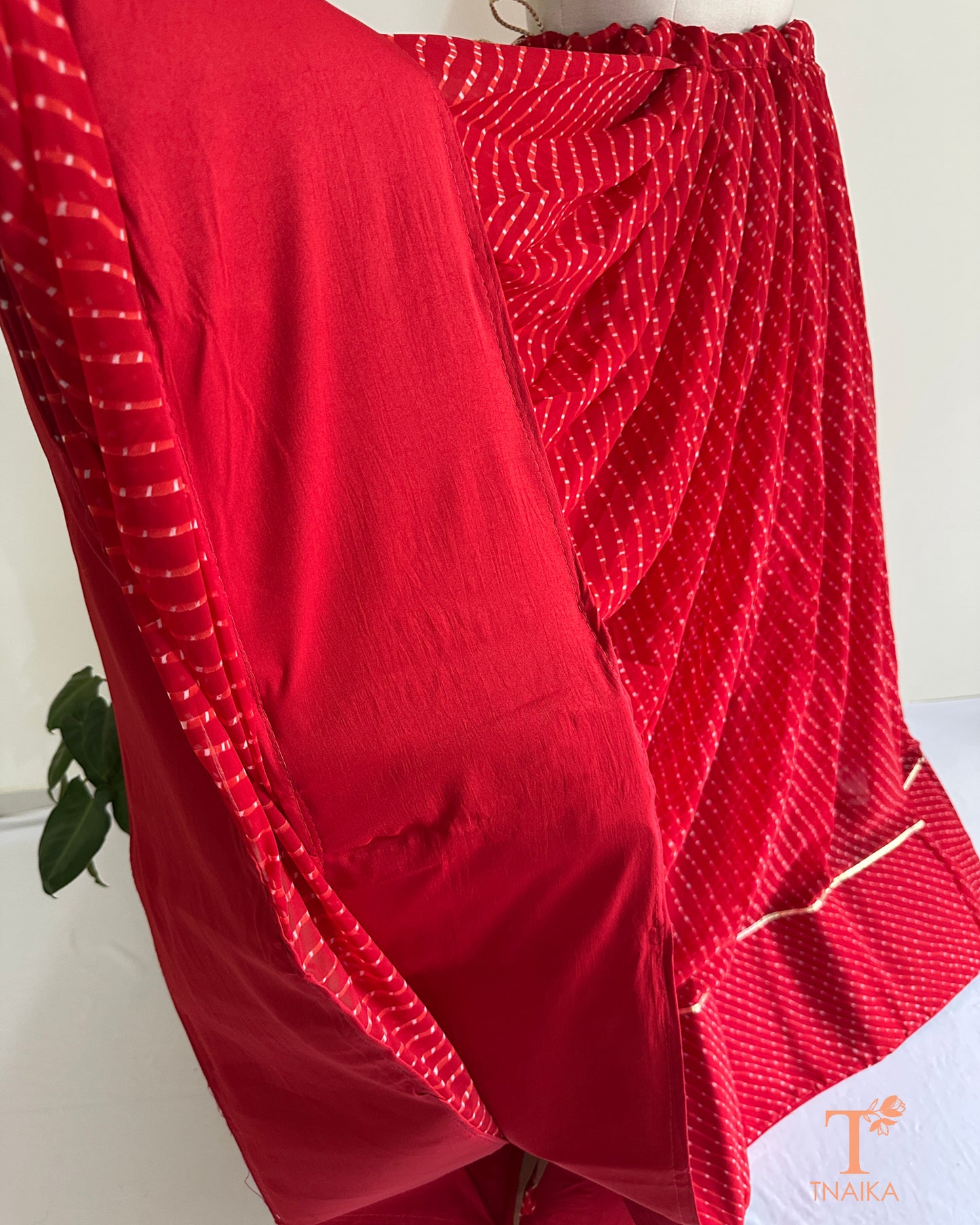 Traditional Leheriya lehenga set in soft georgette fabric with lace accents for an elegant ethnic look