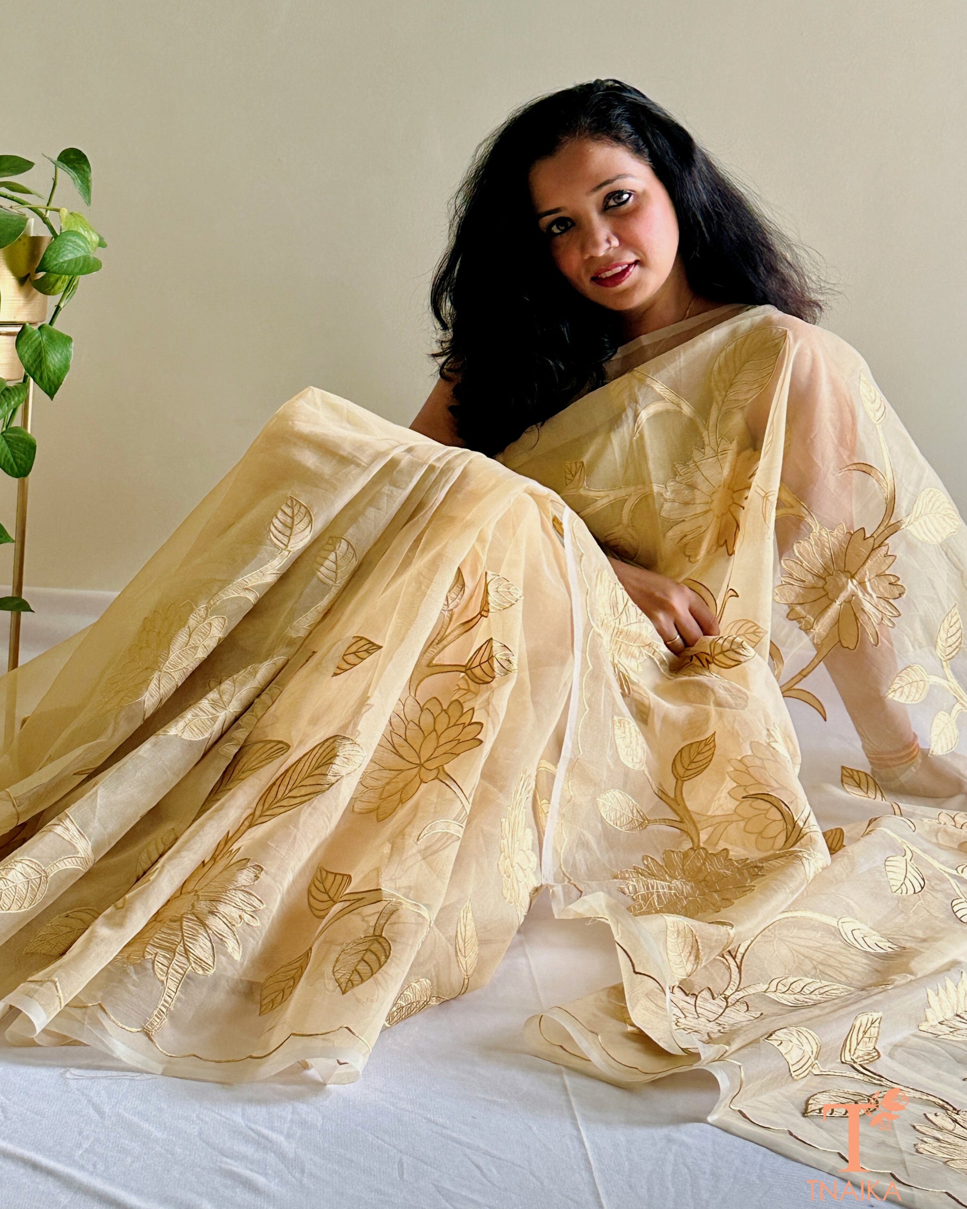 Kora organza saree with floral applique work
