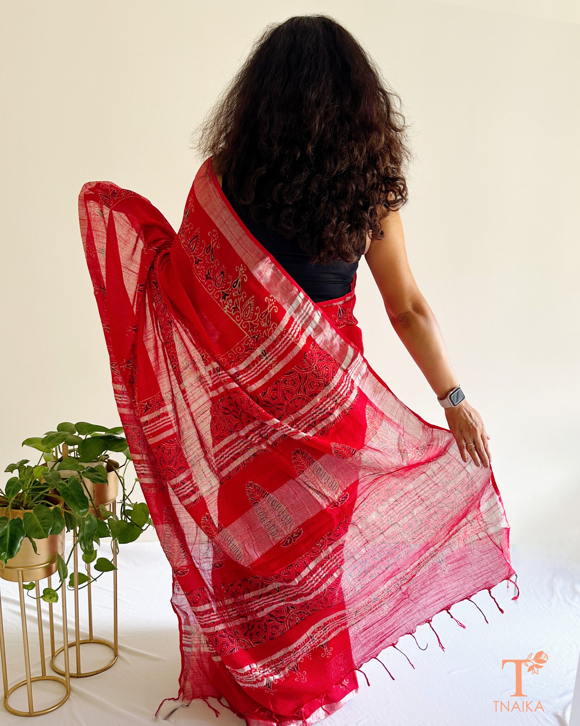 handcrafted red cotton slub linen saree draped on model