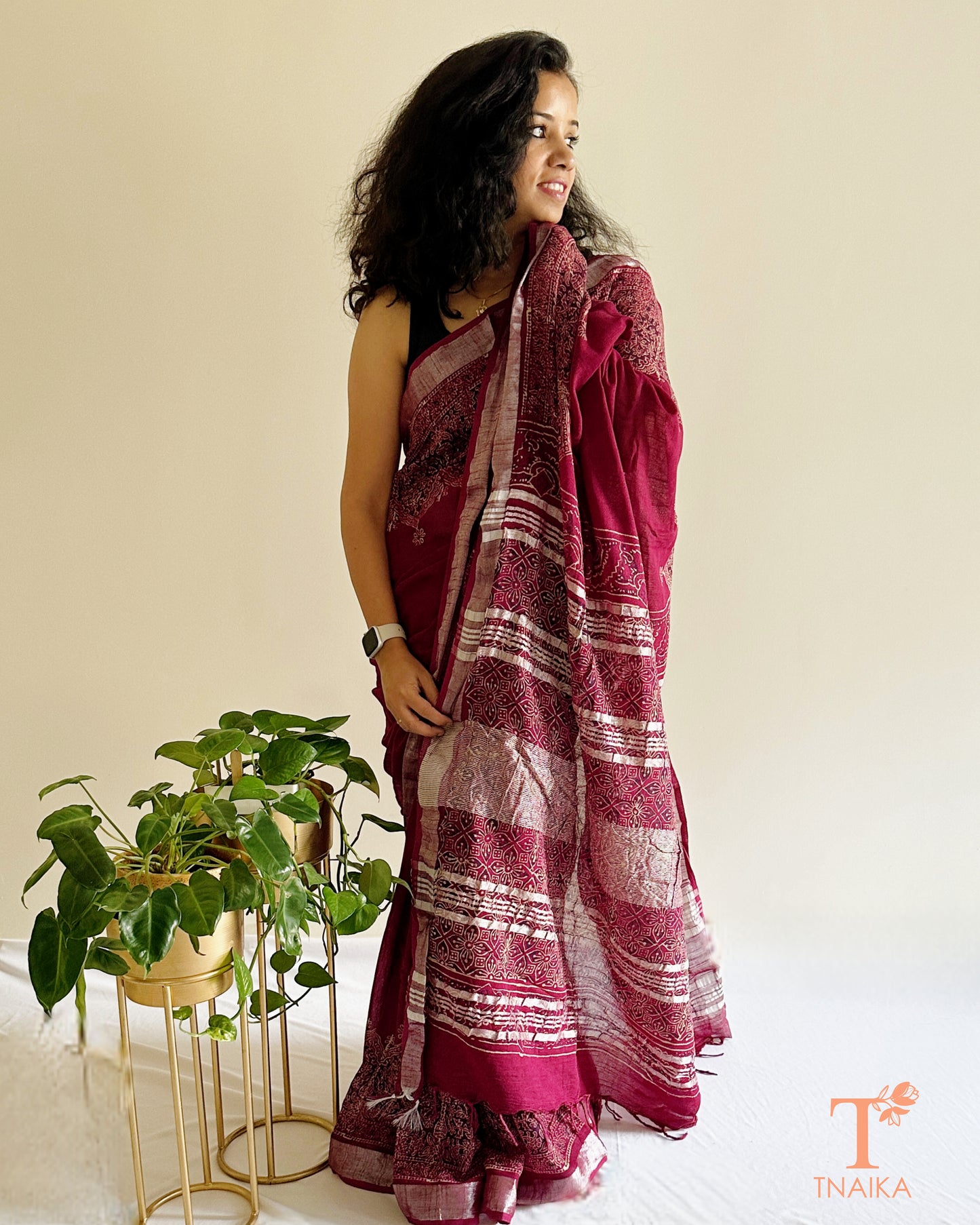artisan wine cotton linen saree draped on model