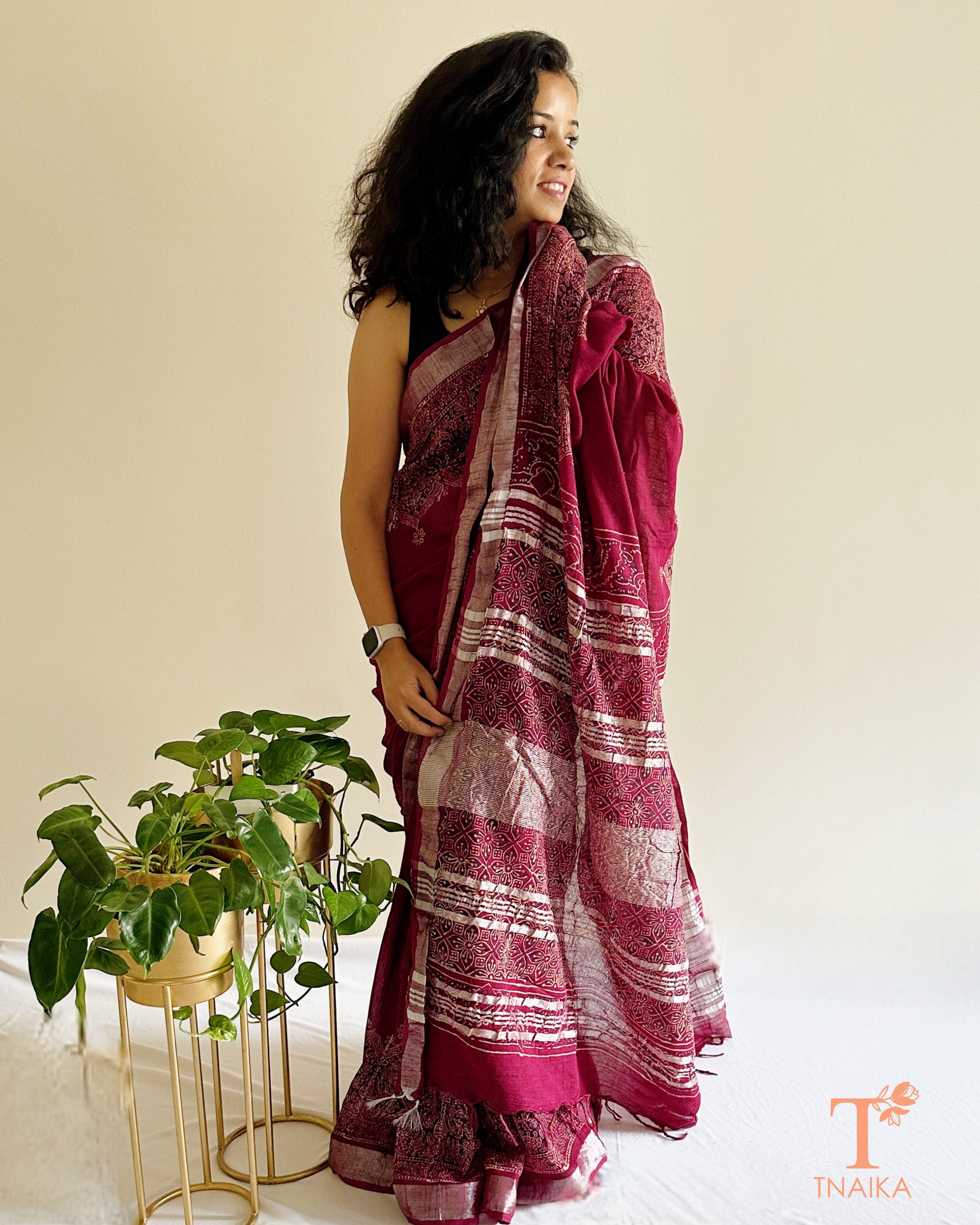 artisan wine cotton linen saree draped on model