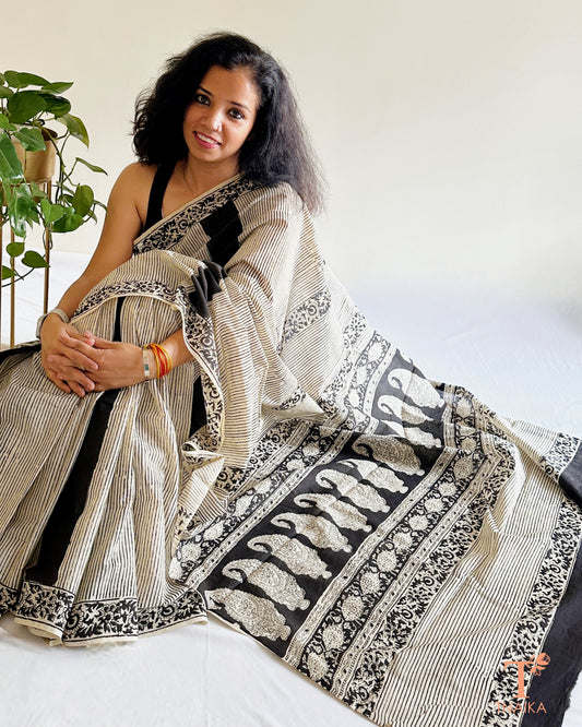 ivory cotton saree with traditional block print border