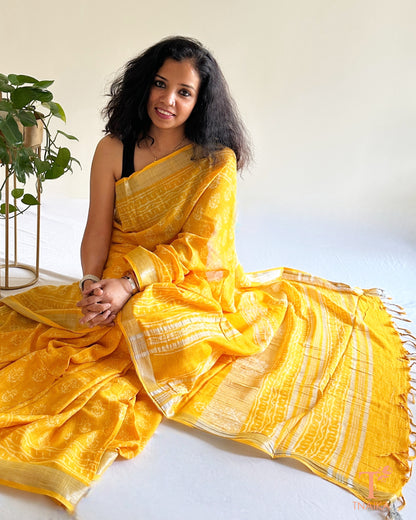 artisan natural dye yellow saree draped on model