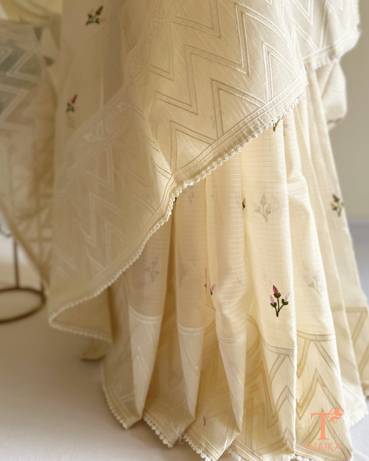 ivory kota silk saree draped on mannequin