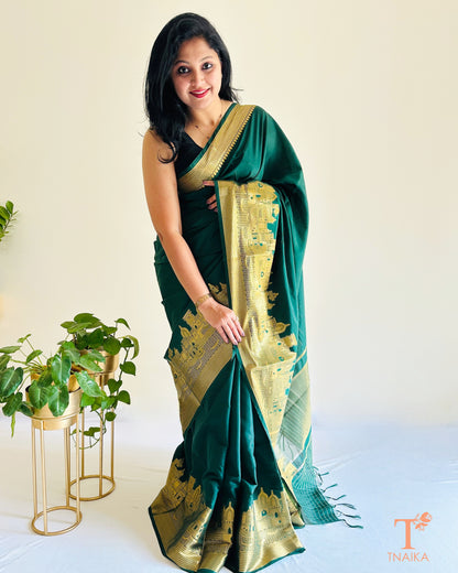 emerald green crepe silk saree with grand zari border