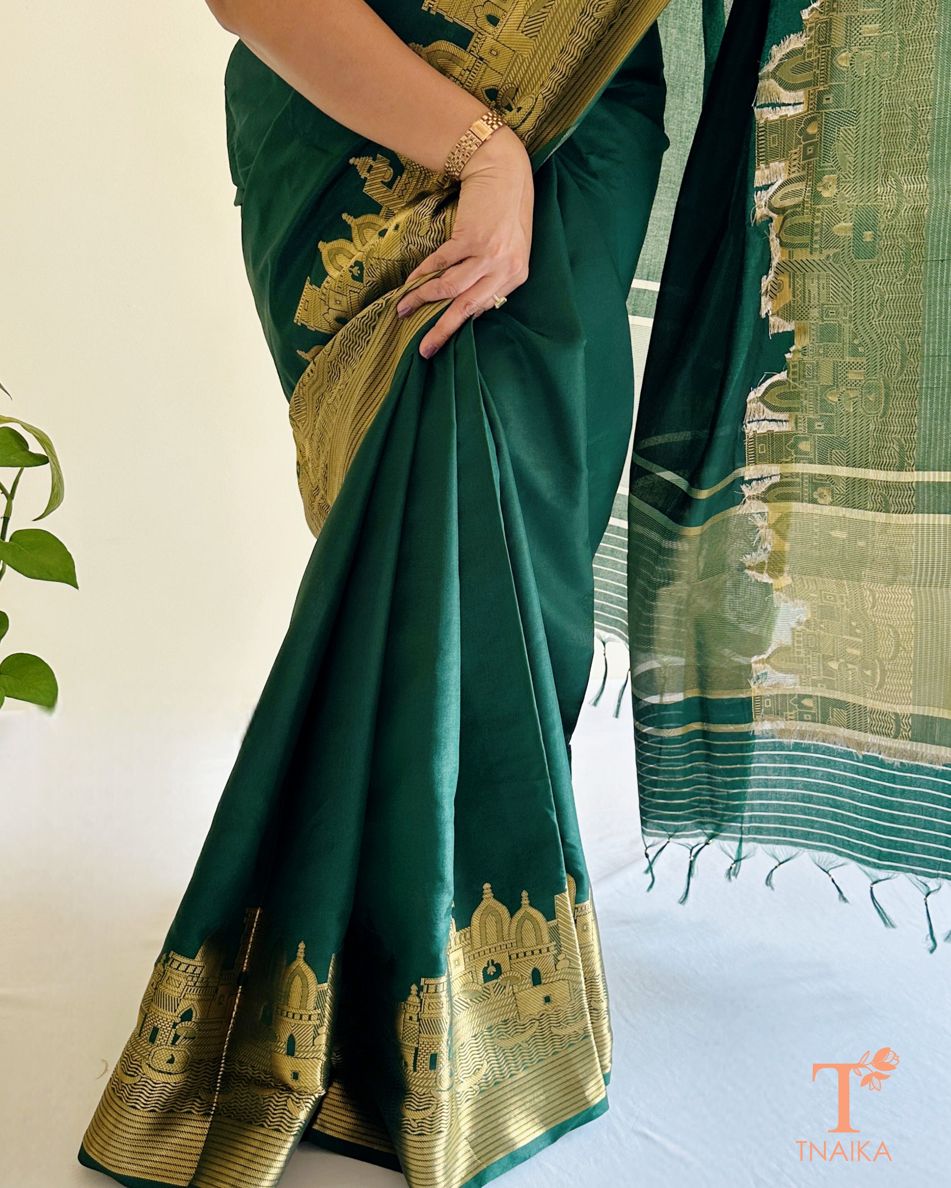 elegant green crepe silk saree draped on model