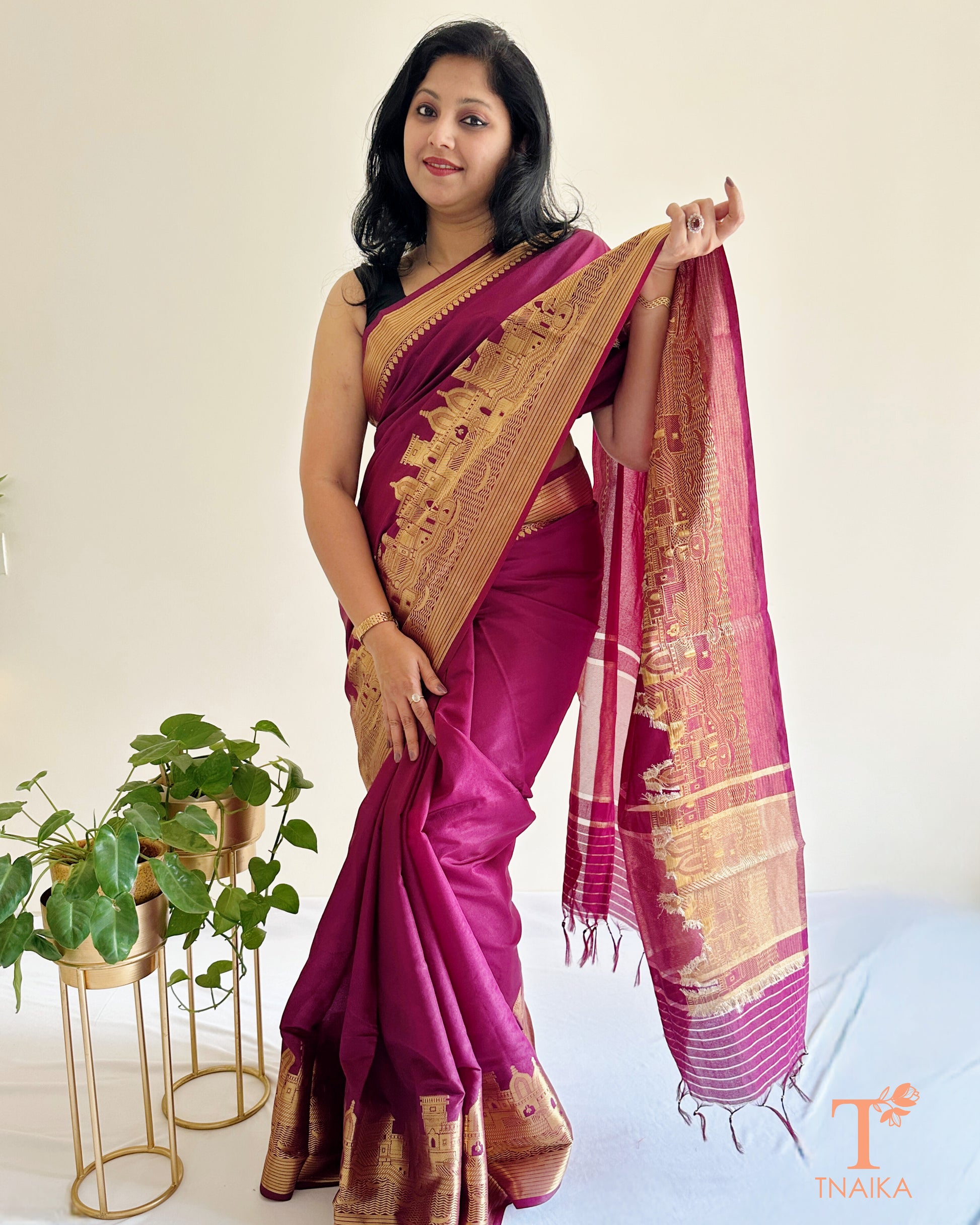 elegant rani pink silk saree draped on model