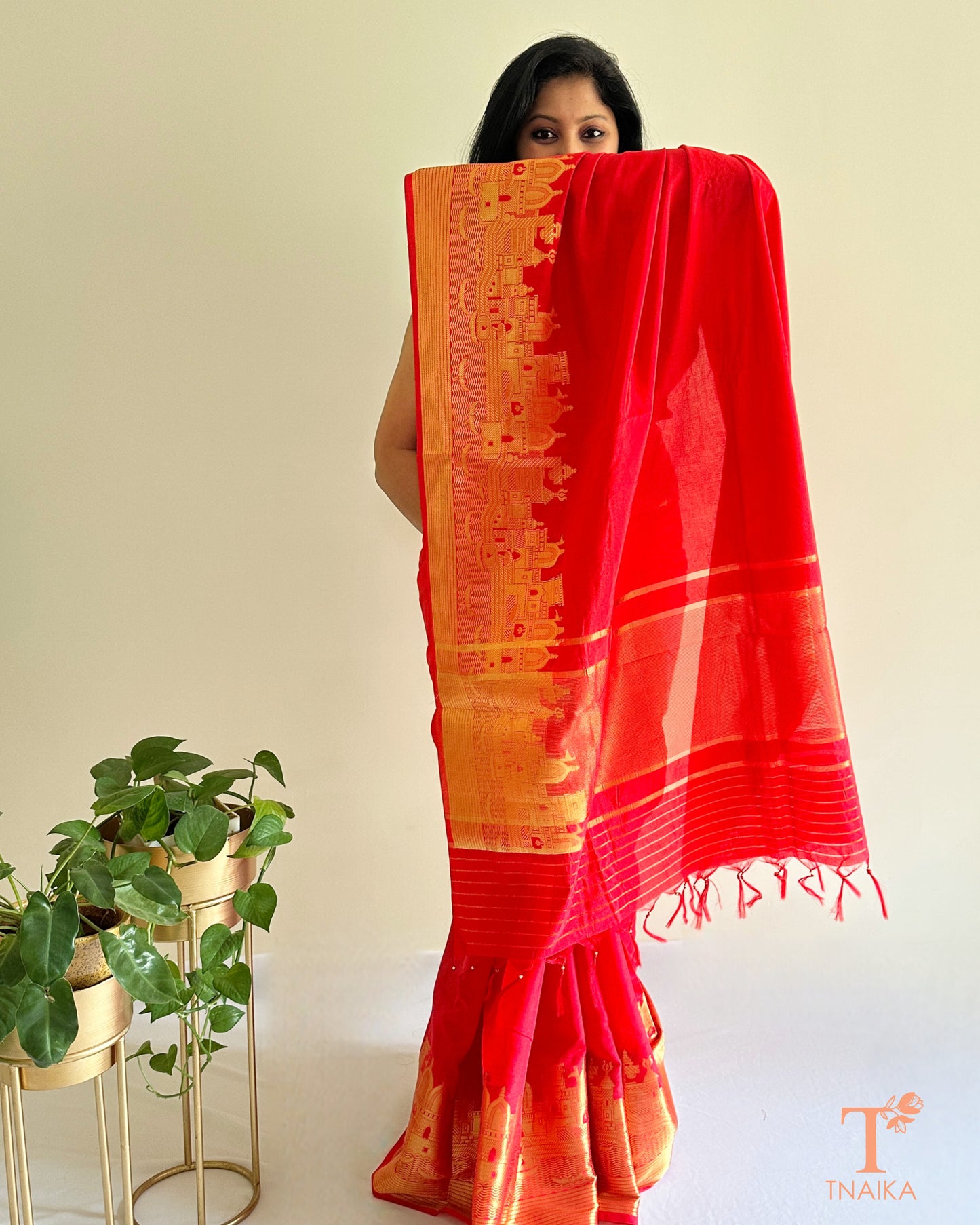 festive red crepe silk saree with heritage motifs