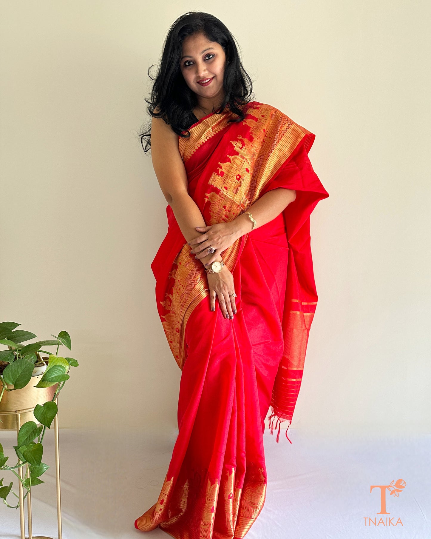 elegant red silk saree draped on model