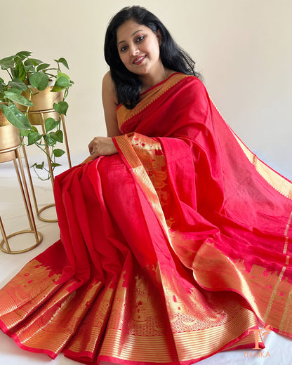 scarlet red crepe silk saree with grand zari border