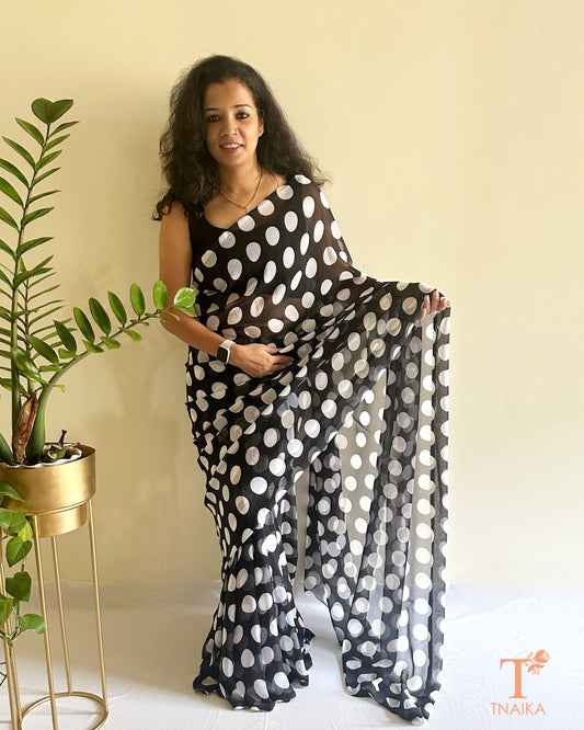 elegant black saree with oversized polka dots