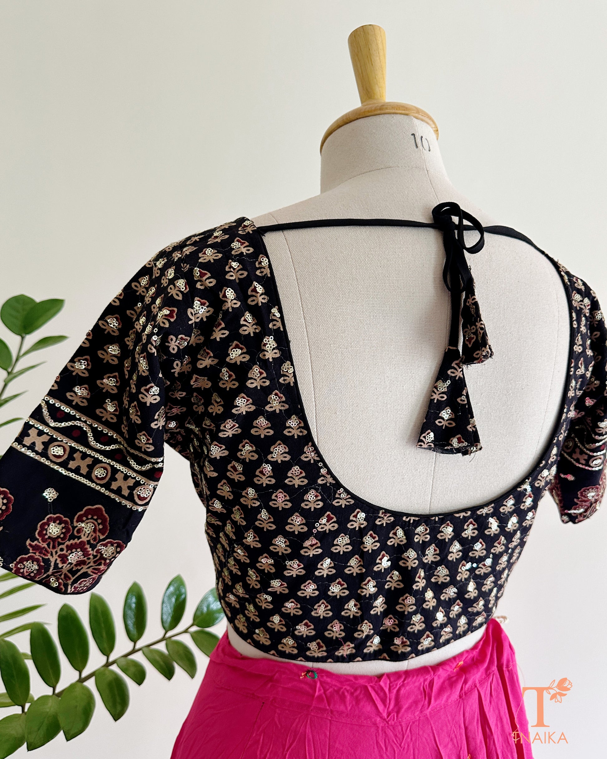 ajrakh blouse sleeve sequence detailing close up