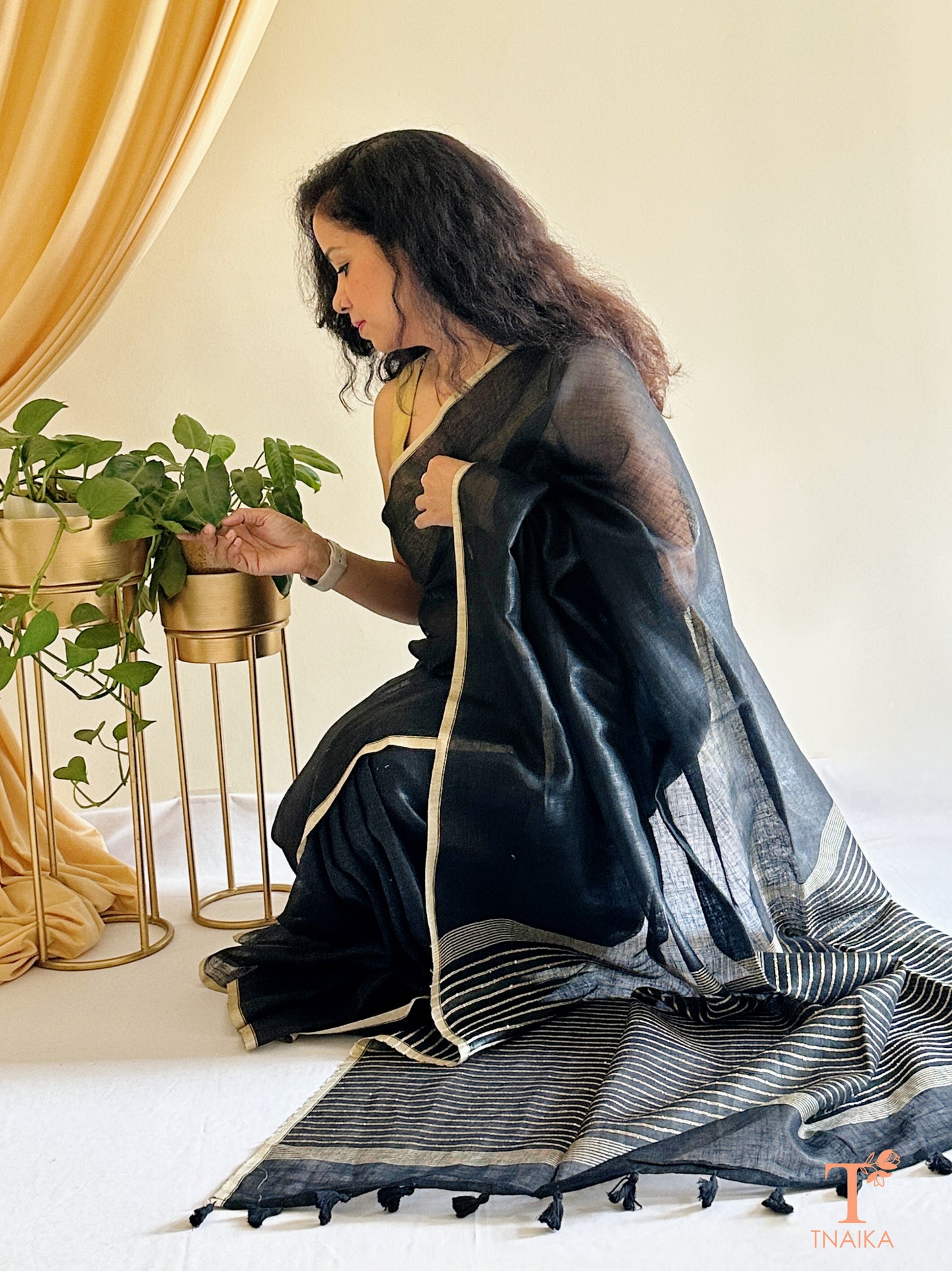 lightweight black linen saree with tassel pallu