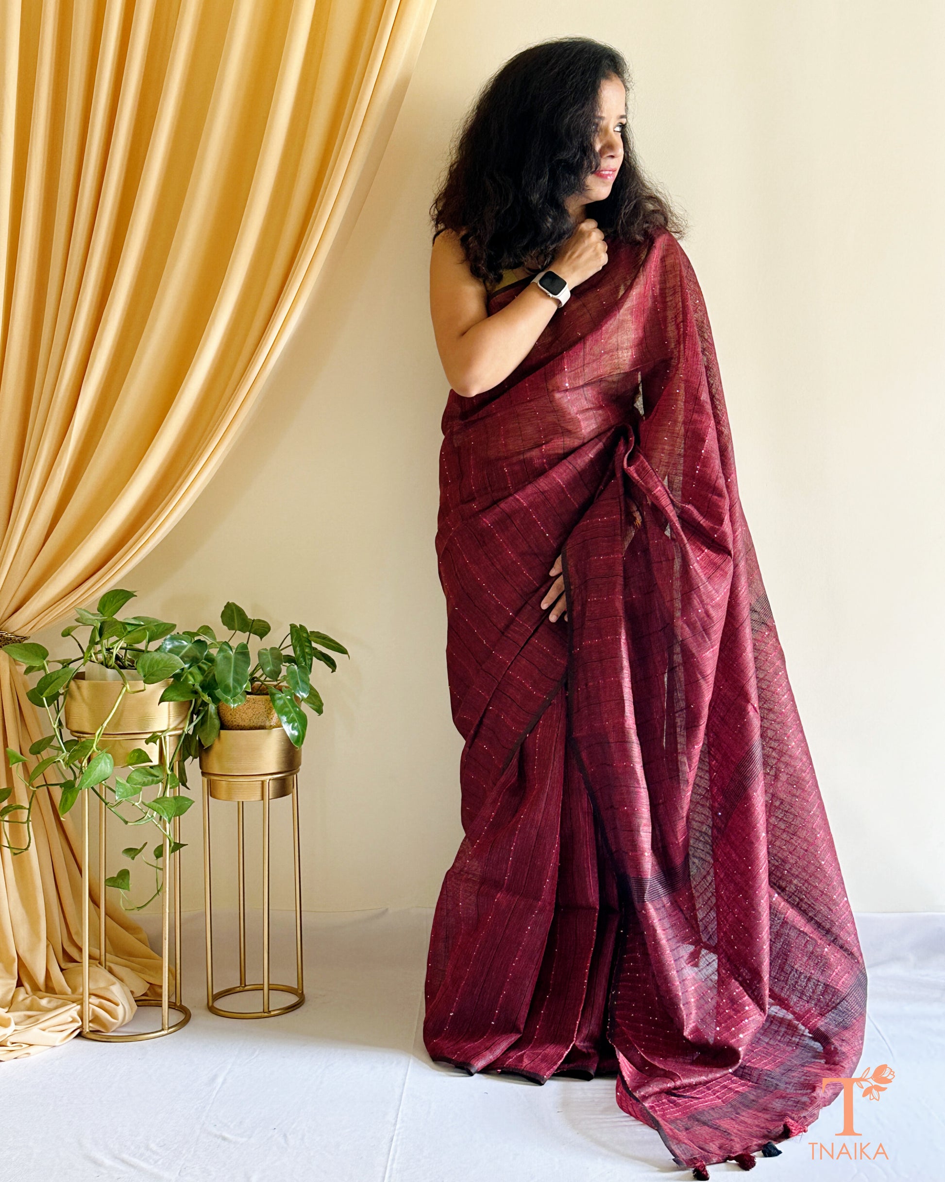 wine red linen saree with fine sequence detailing Tnaika