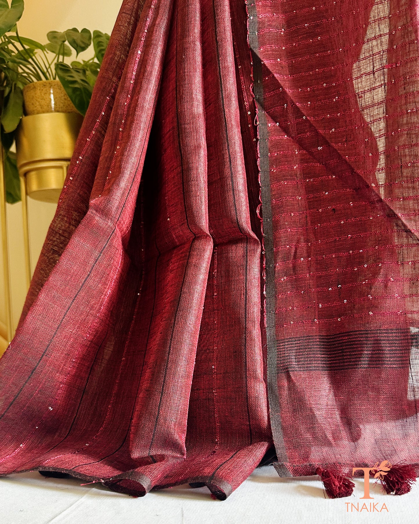 lightweight linen saree with fine line shimmer design