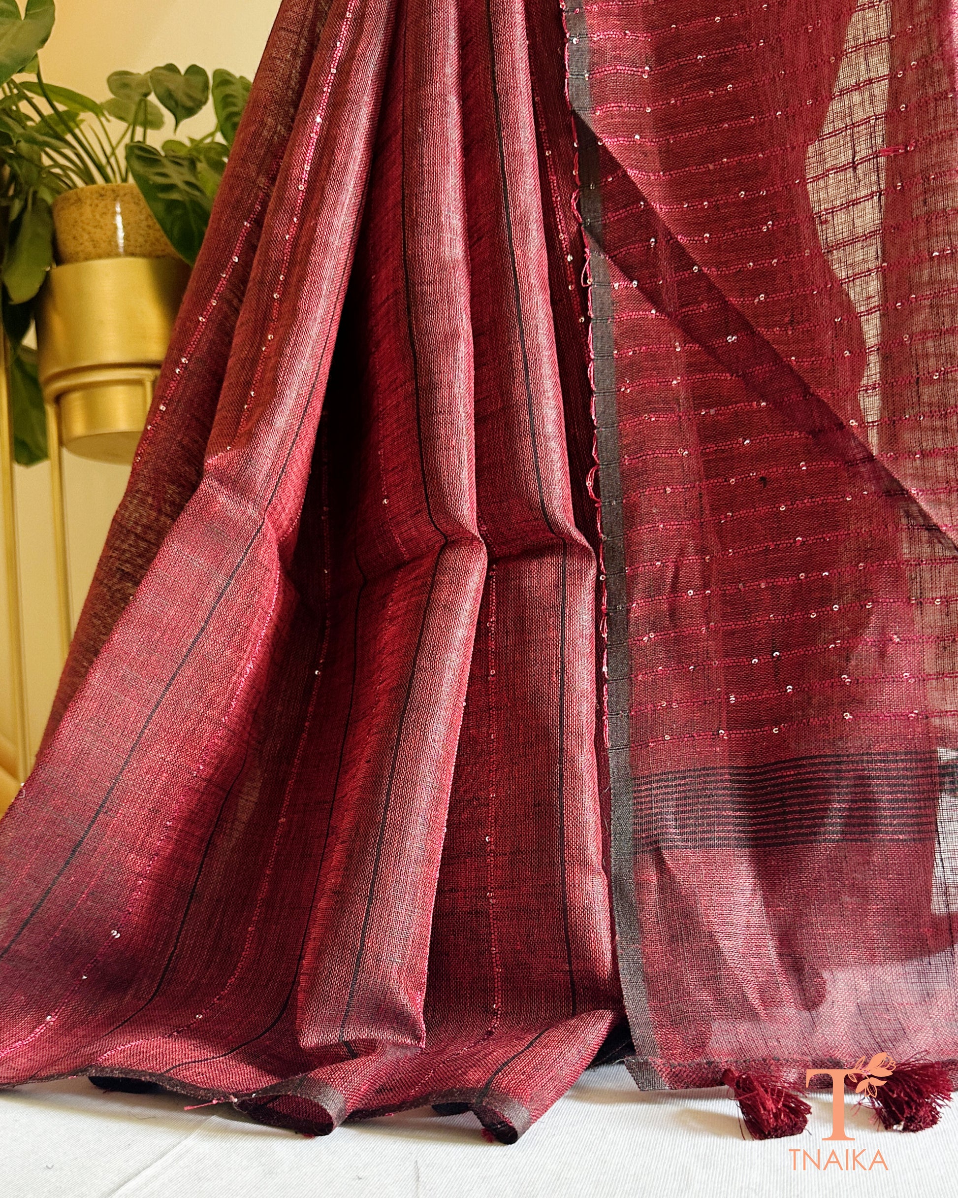 lightweight linen saree with fine line shimmer design