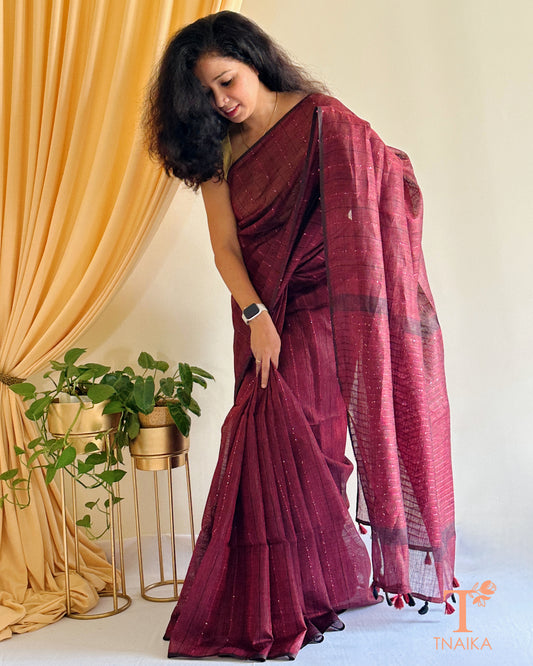 elegant wine linen saree with minimal sequence work