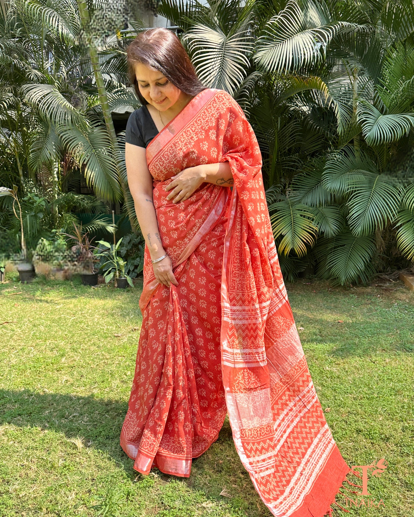 lightweight coral linen saree with natural texture