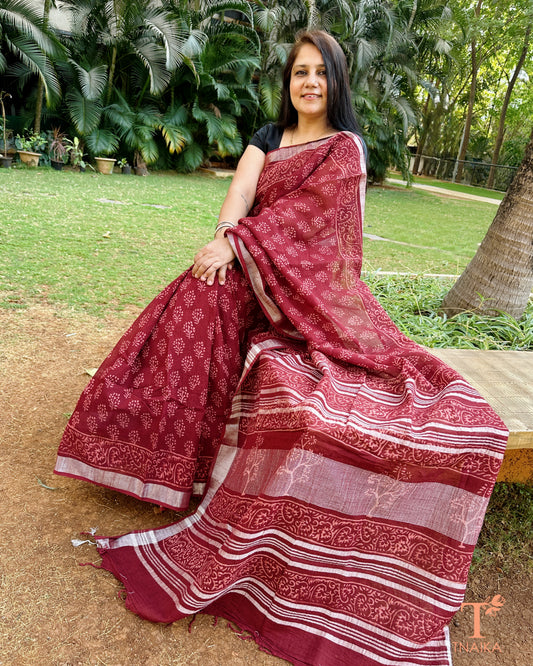 maroon linen cotton slub saree with traditional motifs Tnaika