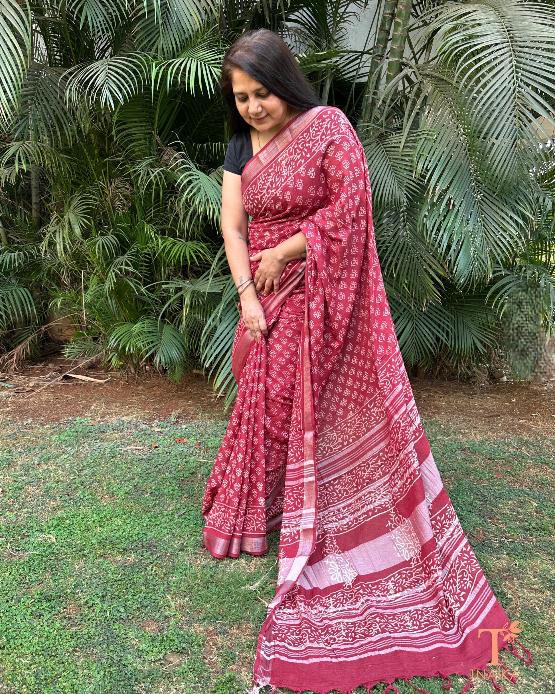 maroon cotton saree with all over kalamkari motifs