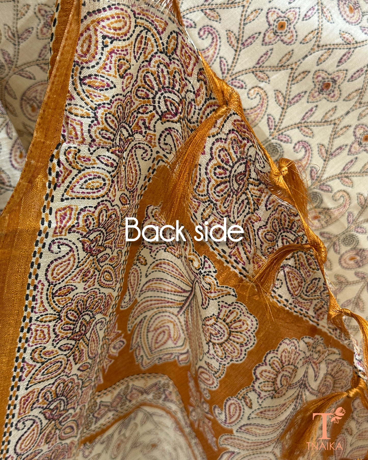 Ethnic dupatta featuring geometric and folk design with tassel finish
