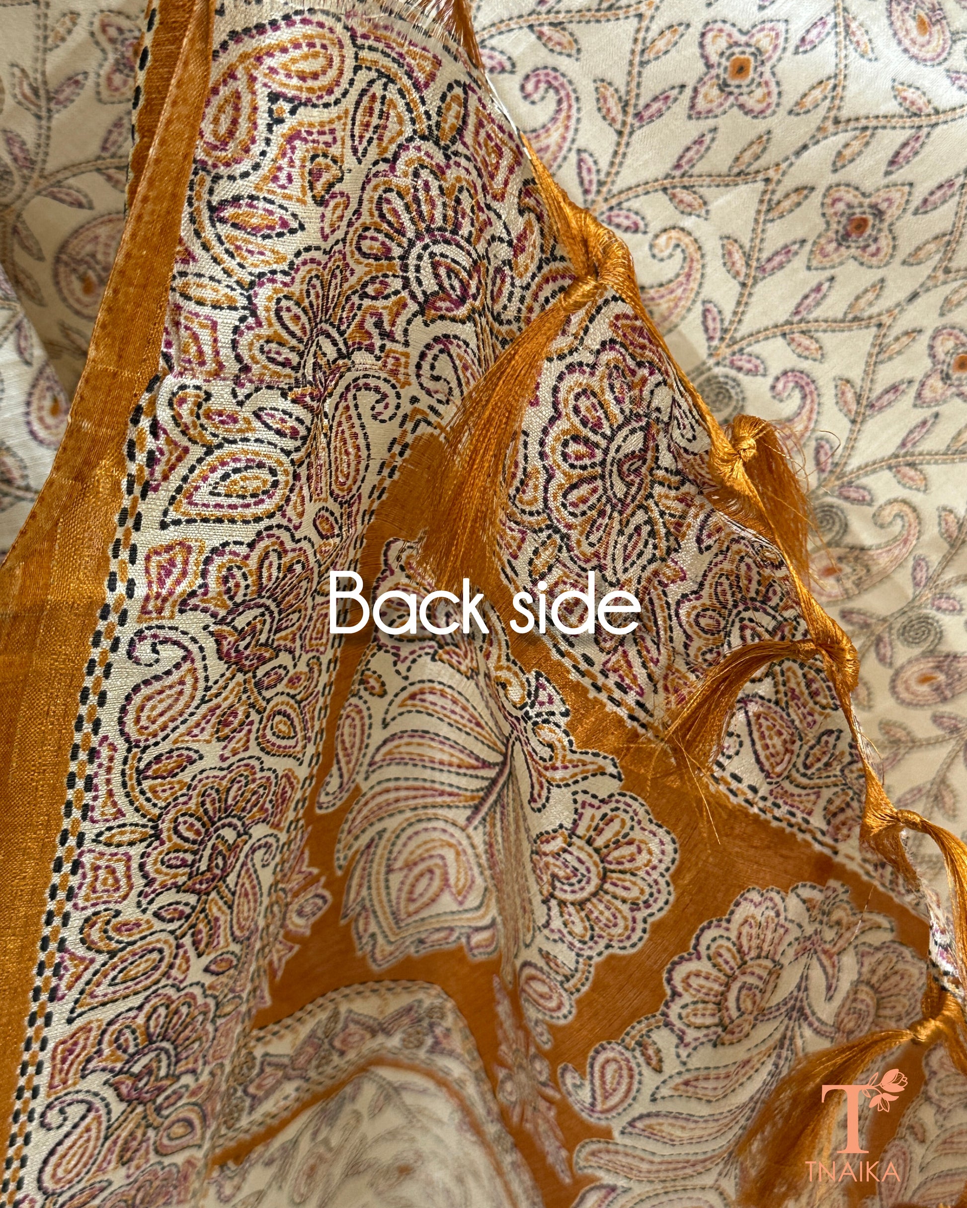 Ethnic dupatta featuring geometric and folk design with tassel finish