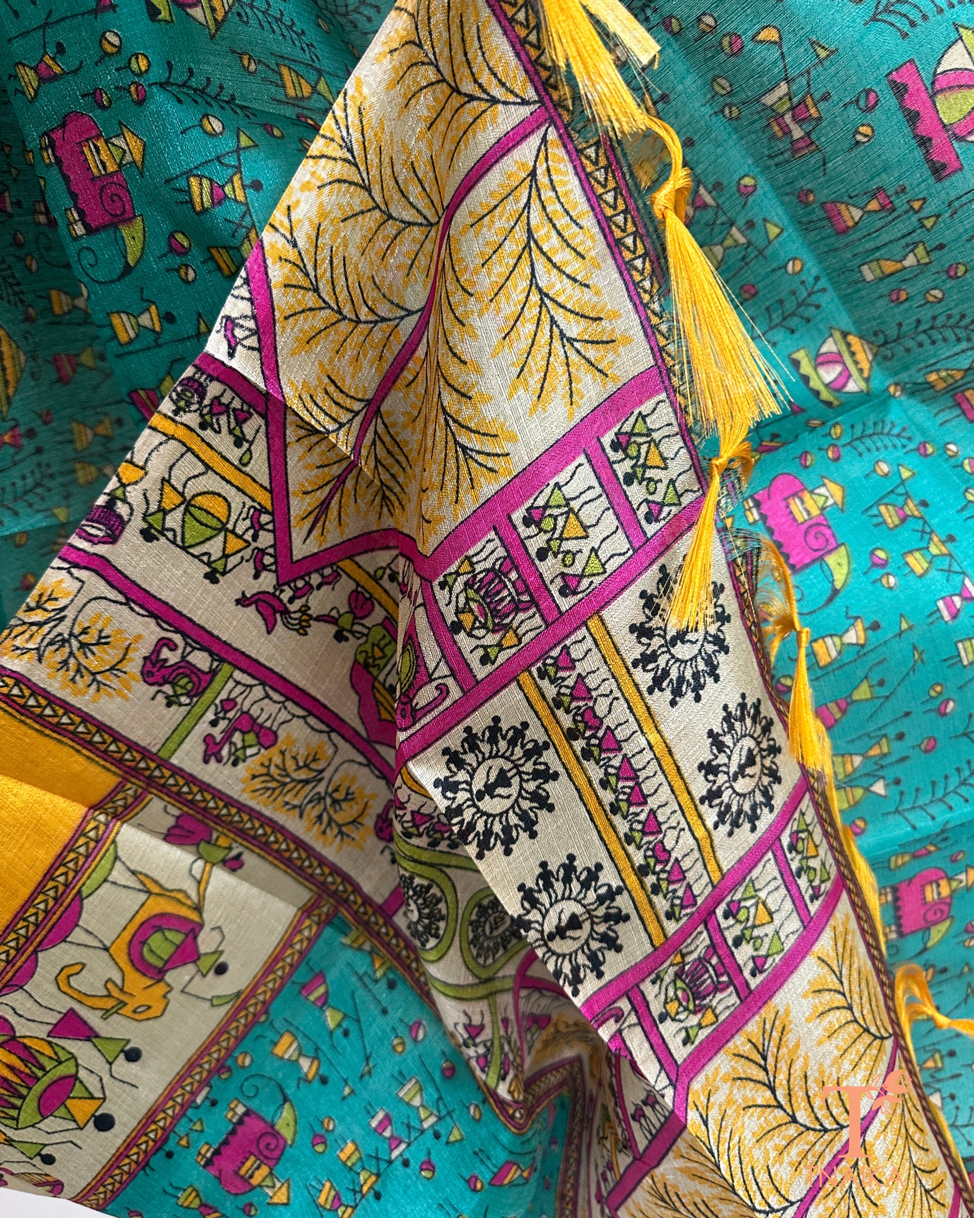 Ethnic dupatta featuring geometric and folk design with tassel finish