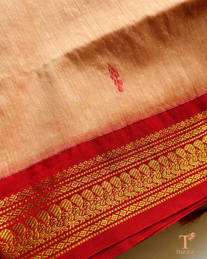Cotton saree with zari woven border and subtle buti design