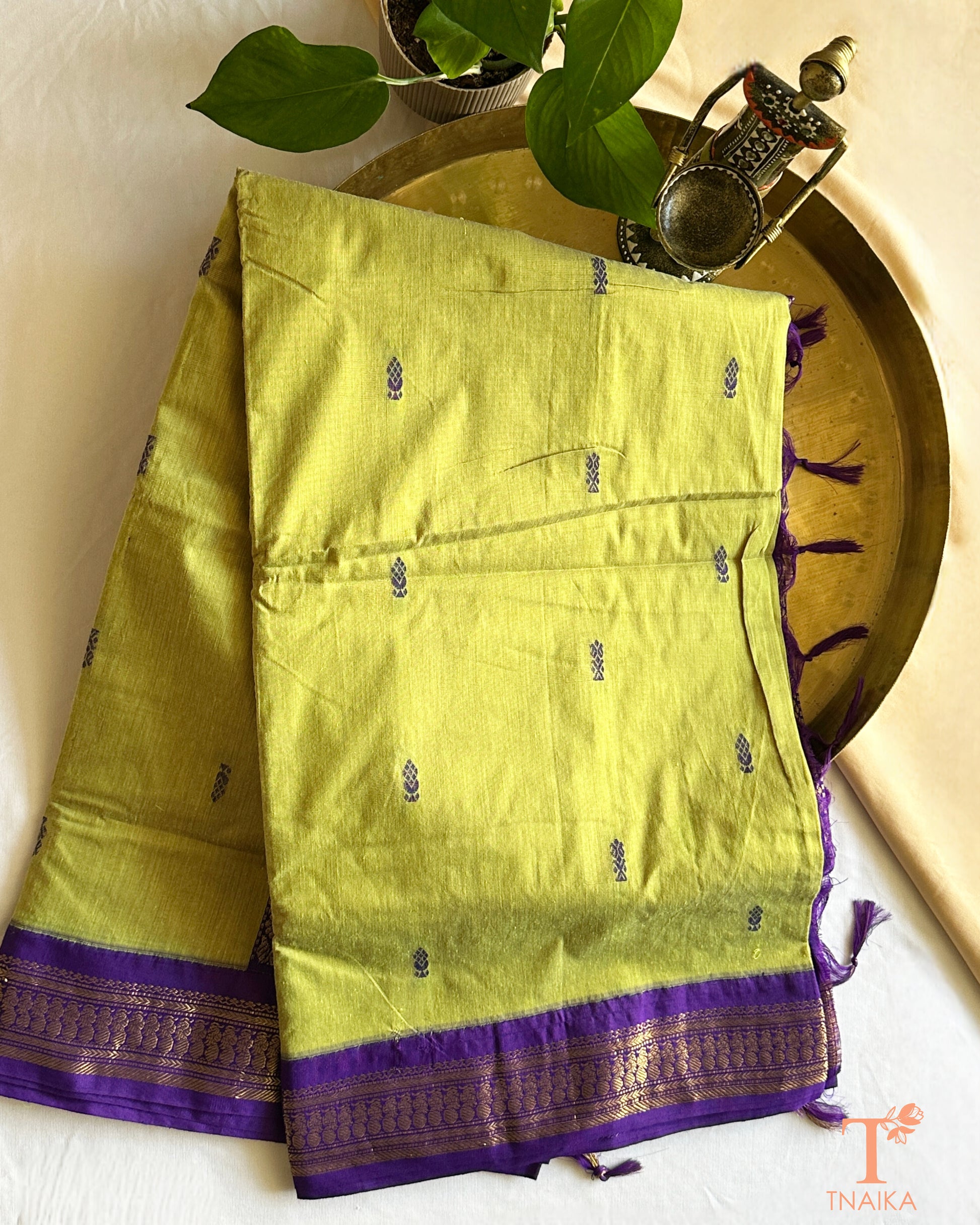 Lightweight cotton saree with intricate zari detailing on border