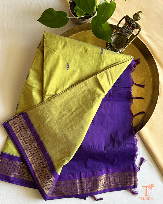 Soft cotton saree featuring traditional woven border and tassels