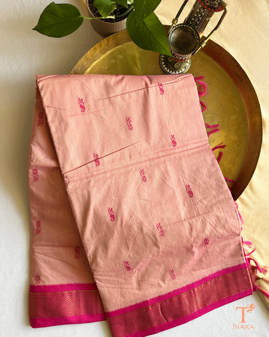 Cotton saree with zari woven border and subtle buti design